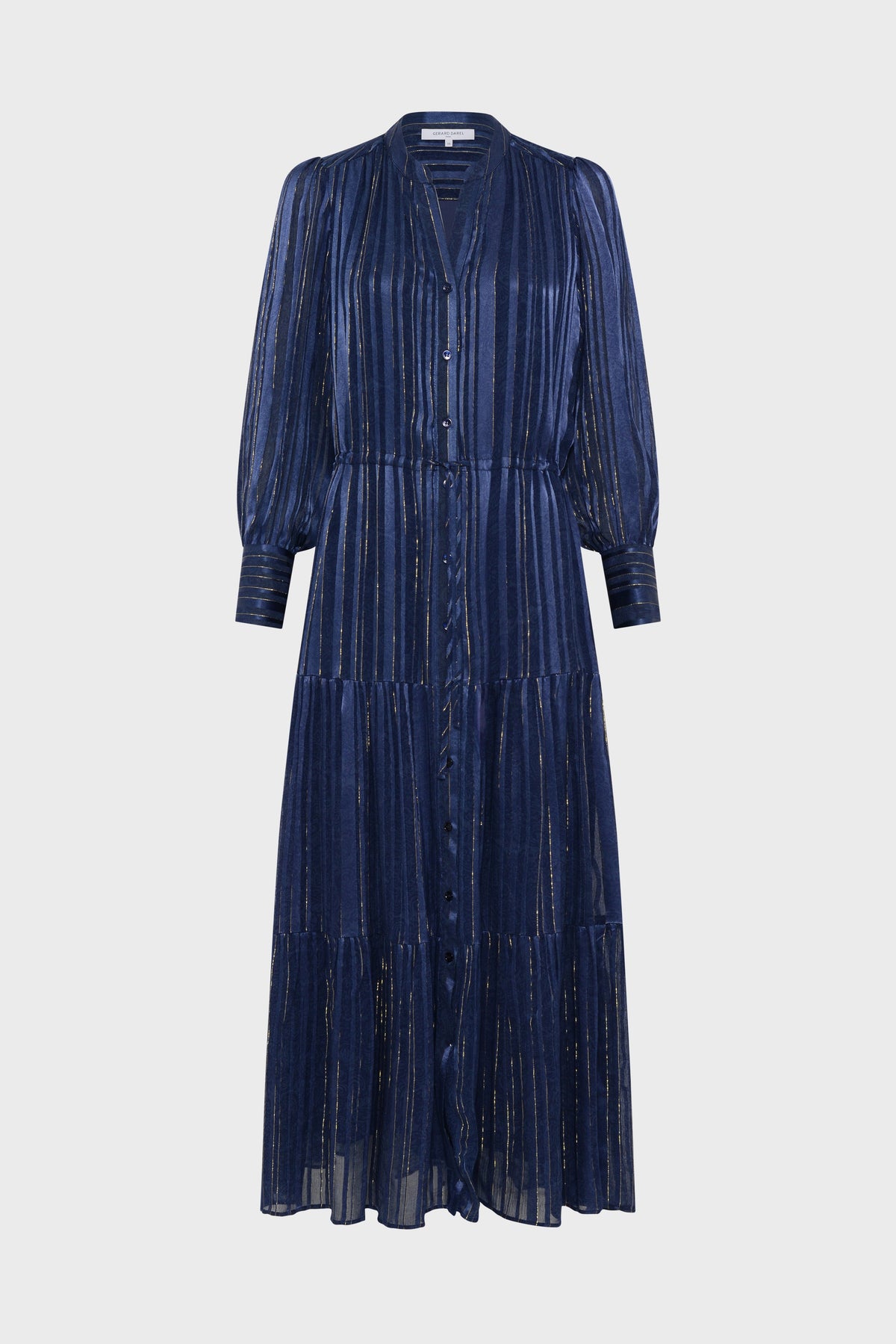 Long-sleeved, navy blue midi dress with vertical metallic stripes in lurex doré, button-down front, tiered skirt, and slight sheen. This robe longue features a classic collar and cuffs, and is displayed against a plain light background.