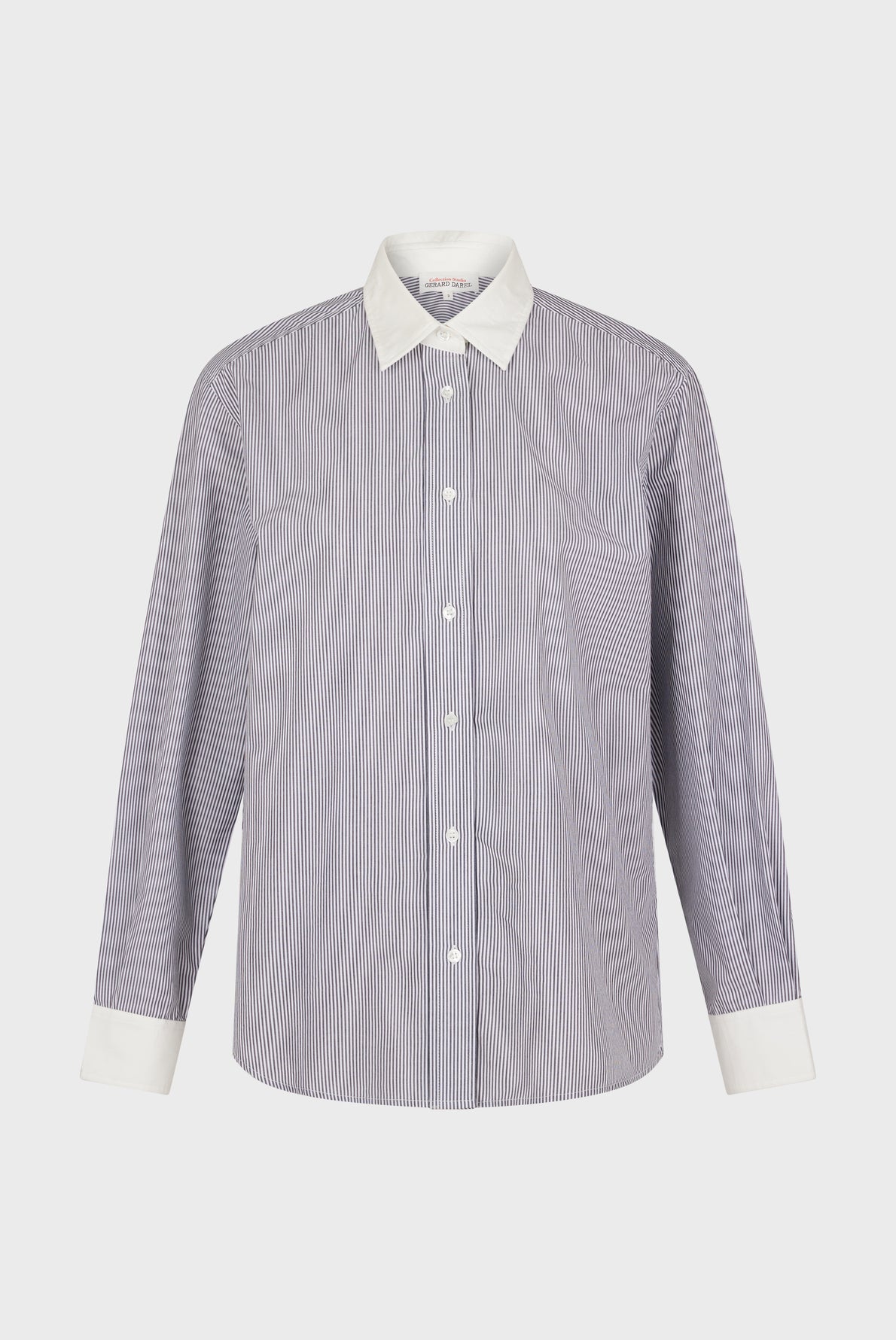 A long-sleeve button-up chemise rayée in popeline coton, featuring thin blue and white vertical stripes, a crisp col blanc, and matching white cuffs, displayed on a plain background.