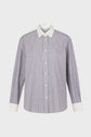 A long-sleeve button-up chemise rayée in popeline coton, featuring thin blue and white vertical stripes, a crisp col blanc, and matching white cuffs, displayed on a plain background.