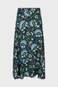 A knee-length skirt with a flowing silhouette, featuring a blue, green, and cream floral pattern on a black background, displayed against a plain light gray backdrop.