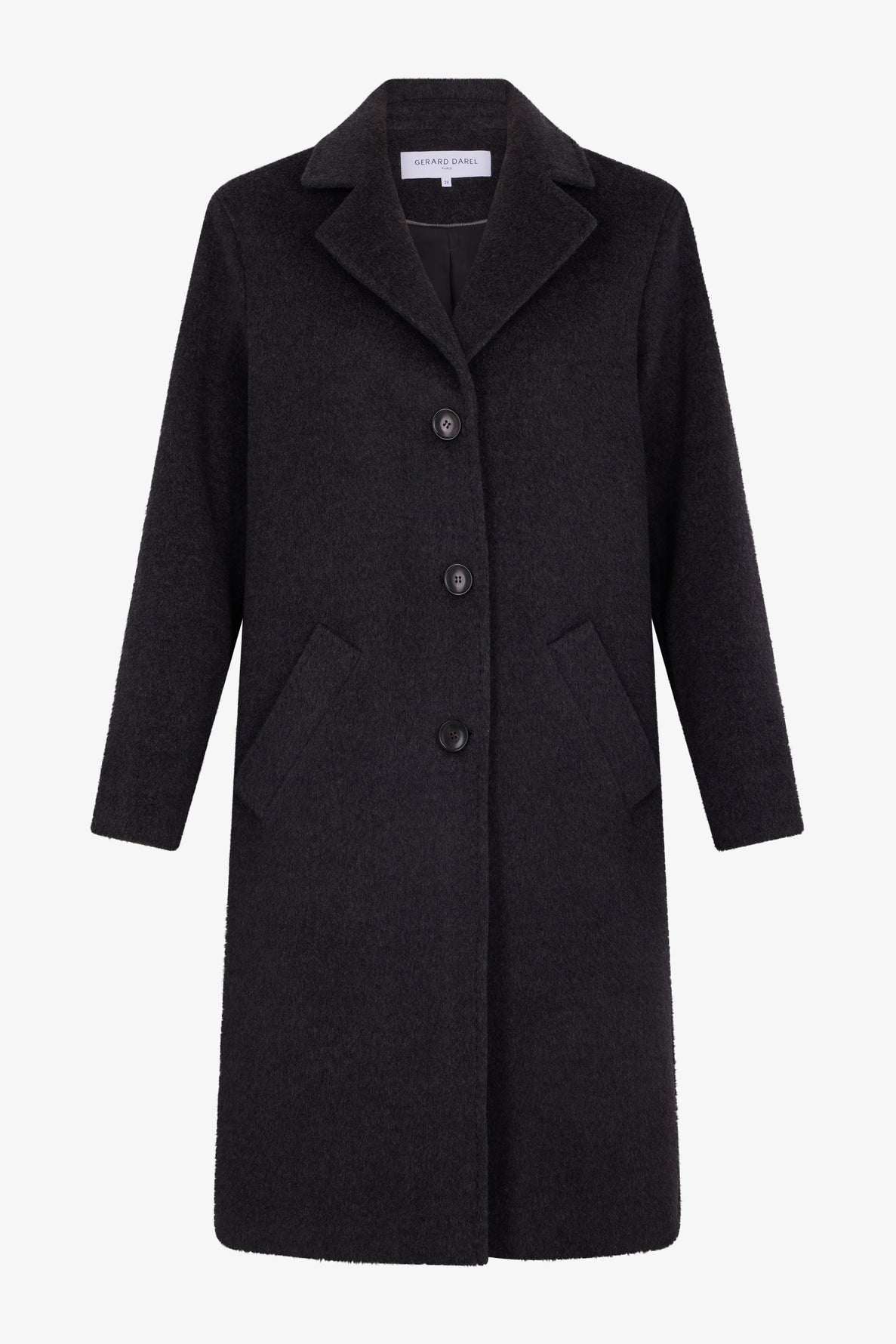 A long, black manteau laine with a notched collar, three front buttons, and two slanted pockets, displayed against a white background.