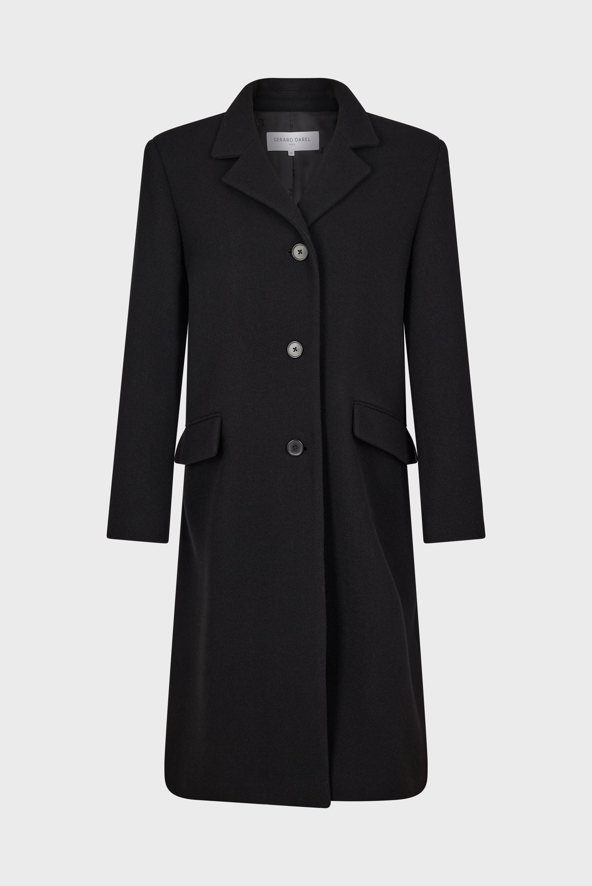 A black, knee-length wool coat—ideal as a manteau mi-long femme—features three buttons, a notched collar, and two front flap pockets, displayed against a plain white background.
