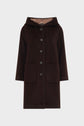 A black, knee-length manteau à capuche with long sleeves, front buttons, two large front pockets, and a hood, crafted from wool-blend fabric and displayed on a plain white background.