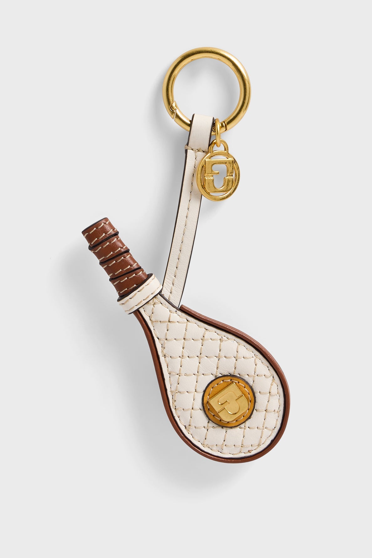 A porte-clés shaped like a quilted tennis racket with gold accents, a brown handle, and a gold keyring featuring a circular logo charm—the perfect charm de sac or charm en cuir to add sporty elegance to your bag.