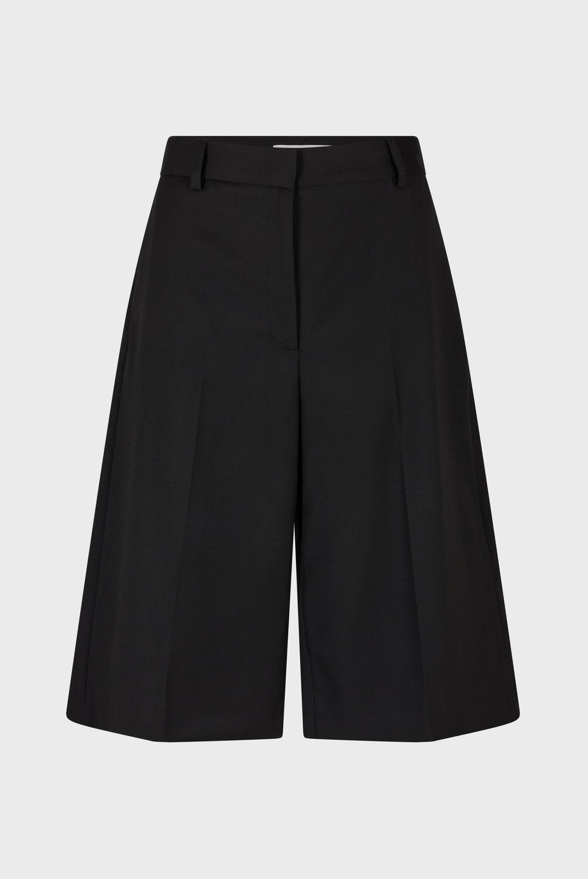 Black knee-length tailored shorts with a front zipper, belt loops, and subtle pleats, displayed on a plain light background.