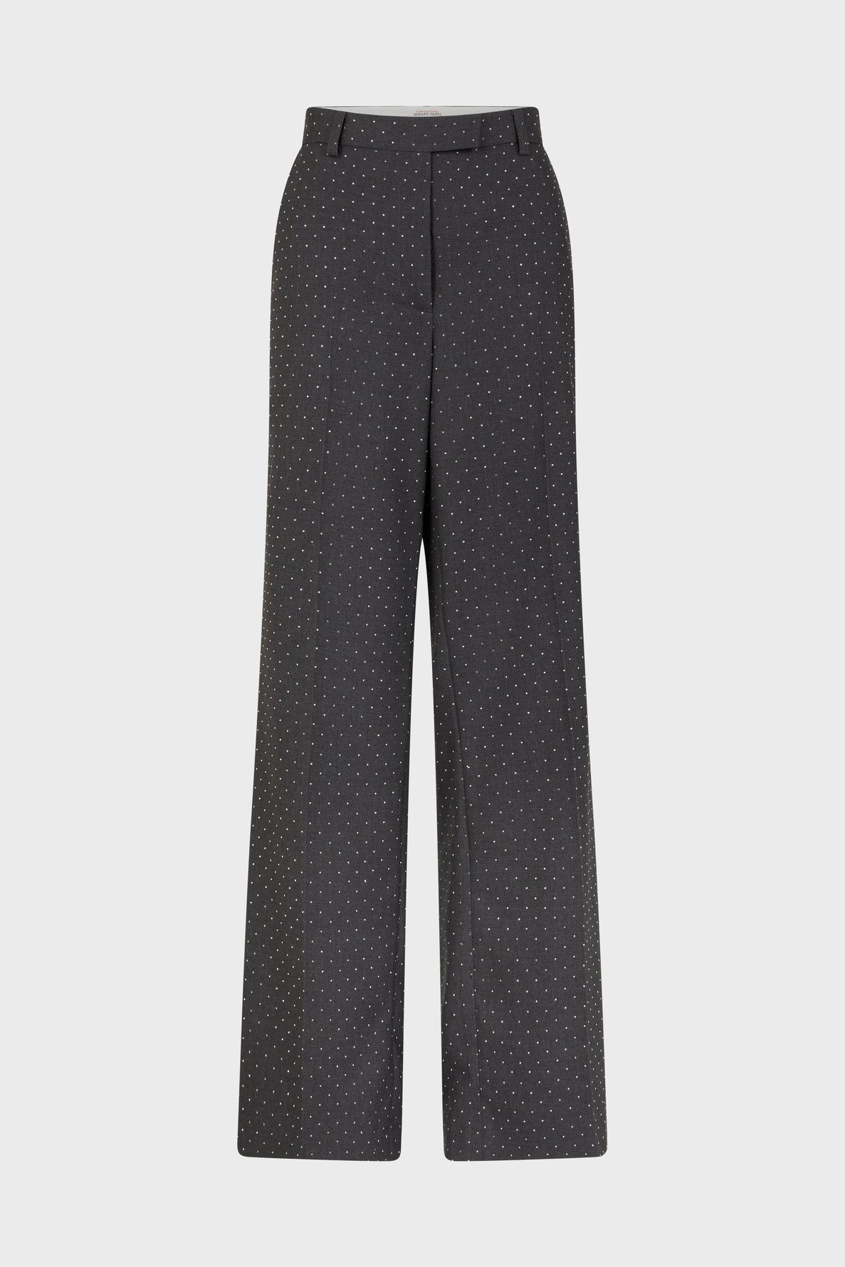 Wide-leg black dress pants from the collection Studio, featuring a subtle white polka dot pattern, belt loops, a front zipper, and a button closure, displayed against a plain white background.