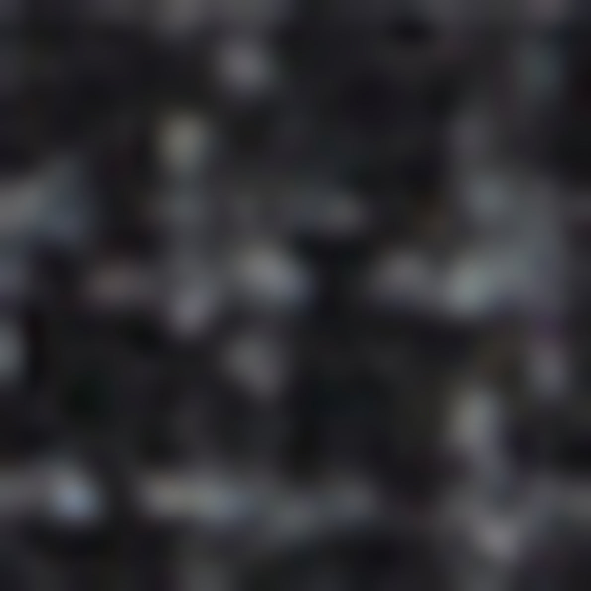 Blurry, dark, and pixelated image with indistinguishable shapes and colors, making it difficult to identify any specific objects or scene—though hints of a pantalon droit from the collection Studio in an imprimé Prince-de-galles pattern may be present.