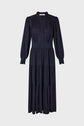 Long-sleeve, ankle-length black dress with a subtle textured pattern, v-neckline, fitted waistband, and tiered skirt, displayed on a plain light background.