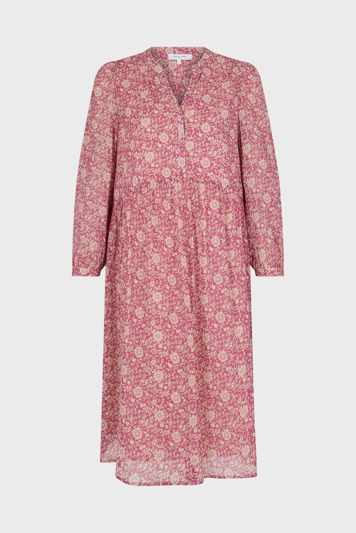 Pink long-sleeve midi dress crafted from crêpe georgette, featuring a white motif floral pattern, a V-neckline, and buttons down the front, displayed on a plain white background.