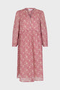 Pink long-sleeve midi dress crafted from crêpe georgette, featuring a white motif floral pattern, a V-neckline, and buttons down the front, displayed on a plain white background.