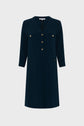A knee-length, dark navy robe en soie with three-quarter sleeves, adorned with boutons dorés down the front and two chest pockets. The dress also features two hip pockets with gold button details, combining elegance and practicality in this chic robe courte.