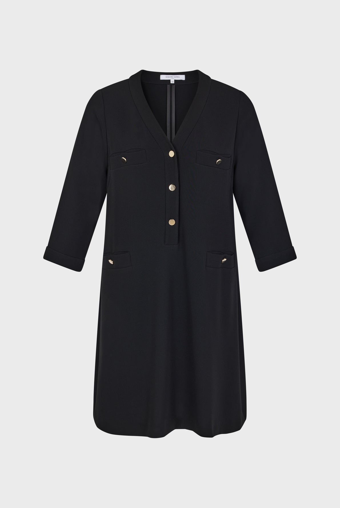 Black knee-length robe courte noire with three-quarter sleeves, a V-neckline, four boutons dorés, and four front flap pockets. The dress is displayed on a plain white background.
