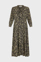 Long-sleeve, midi-length robe longue with a dark motif floral pattern, featuring a col lavallière neckline and button-down front, displayed against a plain white background.
