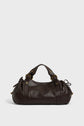 Dark brown sac à main in cuir délicat with gold hardware, double handles, and drawstring side details, placed against a plain light background—a refined piece of maroquinerie Darel craftsmanship.
