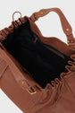 Open brown leather sac à main with gold hardware, black fabric interior, a zippered pocket inside, and drawstring detailing along the top edge crafted from cuir délicat.