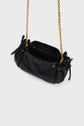 A black leather handbag crafted from cuir grainé, featuring gold chain straps, drawstring sides, and a zippered pocket inside. The brand name GRAND PALAIS is printed in gold on the front, reminiscent of the classic elegance found in Gerard Darel designs. The bag is sitting on a light gray background.