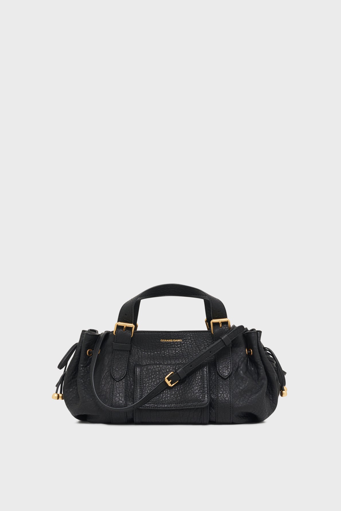 A black sac à main cuir designer handbag with gold hardware, dual top handles, a front flap pocket, and an adjustable shoulder strap crafted from luxurious cuir bubble, displayed against a plain light background.