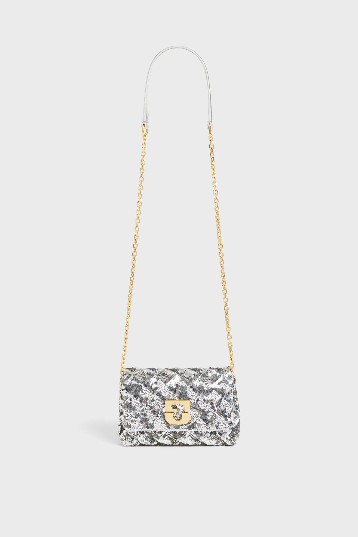 Small silver quilted sac bandoulière handbag with a gold chain strap and a gold clasp, displayed against a plain white background—an elegant pièce de créateur perfect for elevating any look.