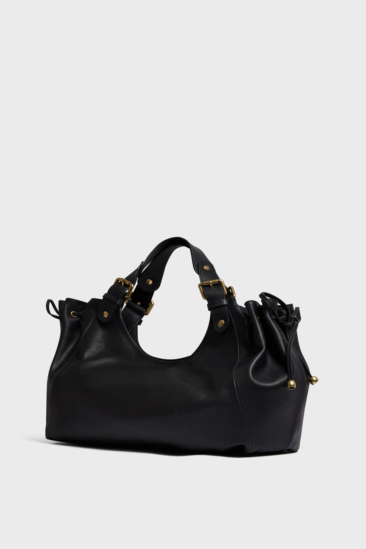 A black leather sac CHIARA GD handbag with gold hardware, two handles, and decorative side drawstrings, placed on a plain light background.