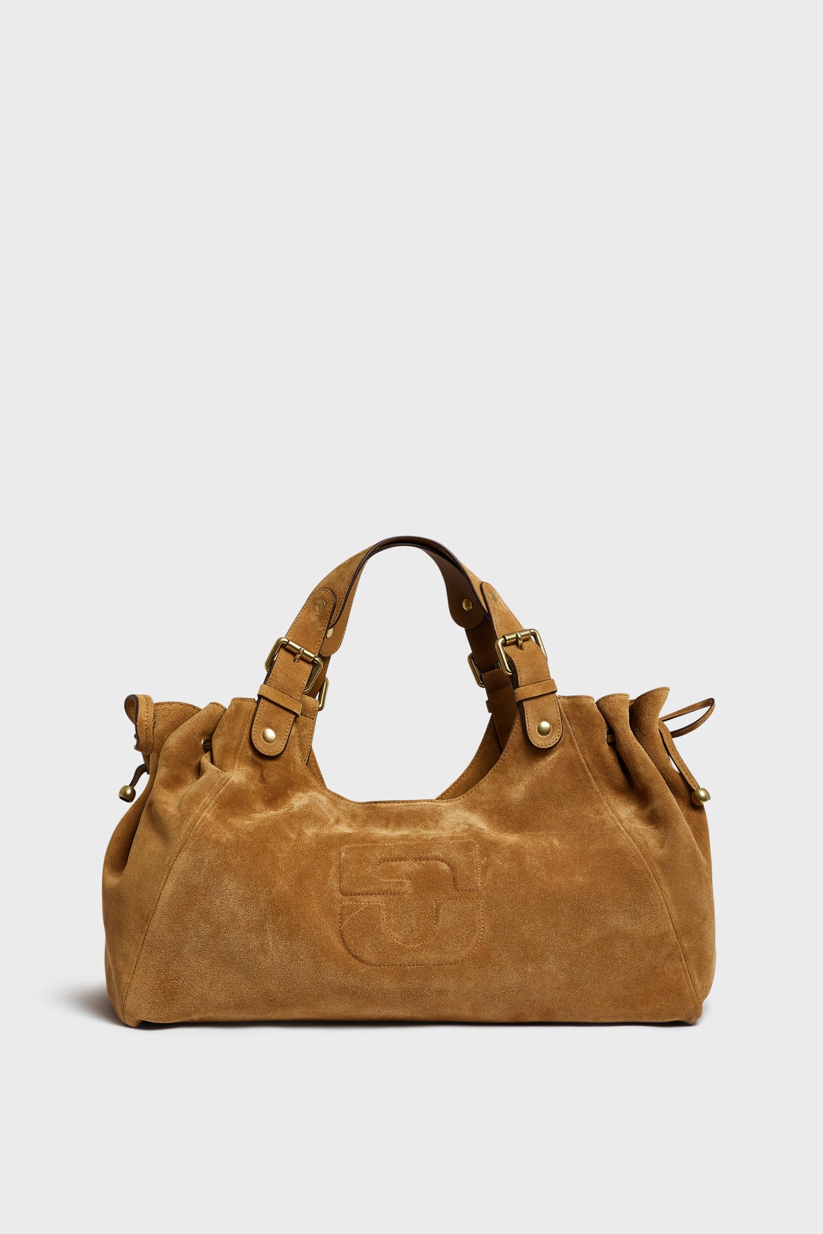 A brown suede sac à main daim handbag with short handles, gold-tone hardware, and a large embossed G logo on the front, inspired by the Maison Darel sac CHIARA GD collection, set against a plain white background.