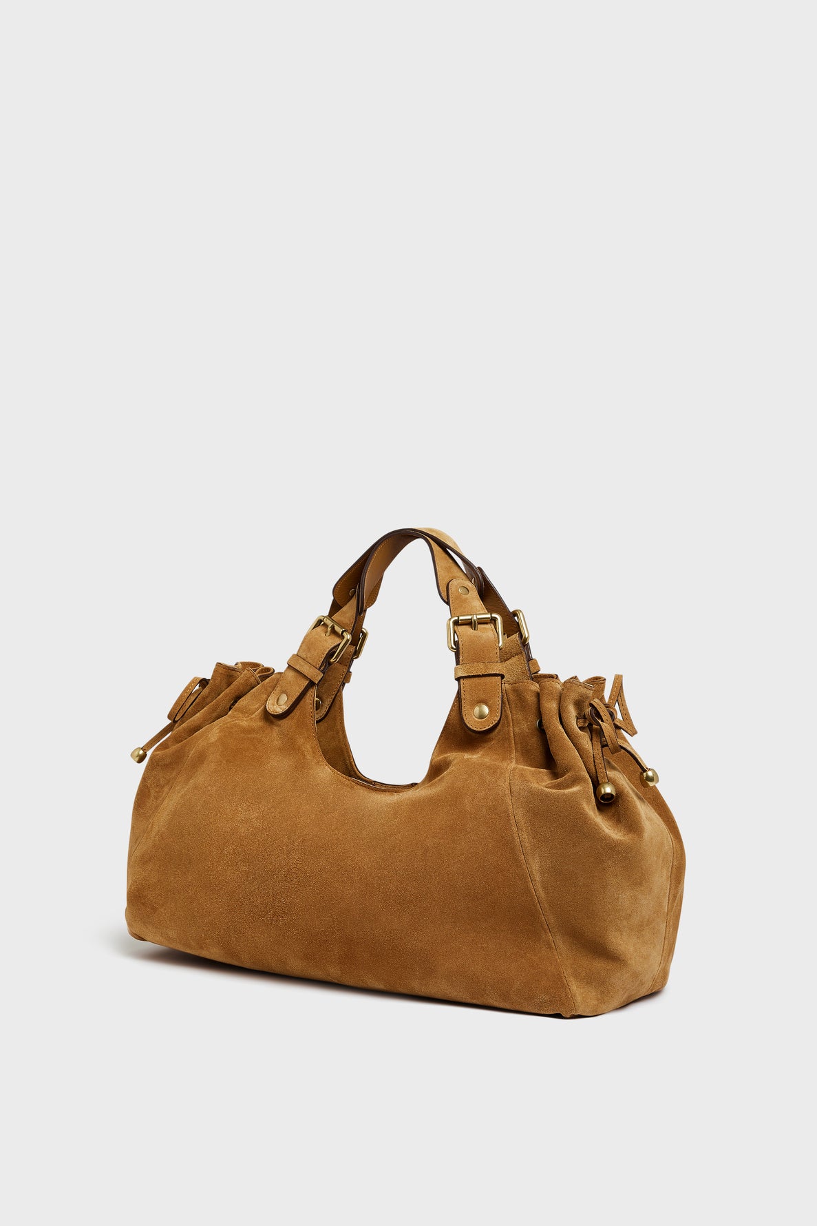 A brown suede sac à main daim by Maison Darel, the sac CHIARA GD features double handles, gold-tone hardware, and decorative buckles, shown against a plain light background.