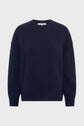 A navy blue, long-sleeve pull col rond sweater with ribbed cuffs, hem, and collar, crafted in a luxurious laine cachemire blend; displayed against a plain white background, this pull Jeannic piece offers both comfort and timeless style.