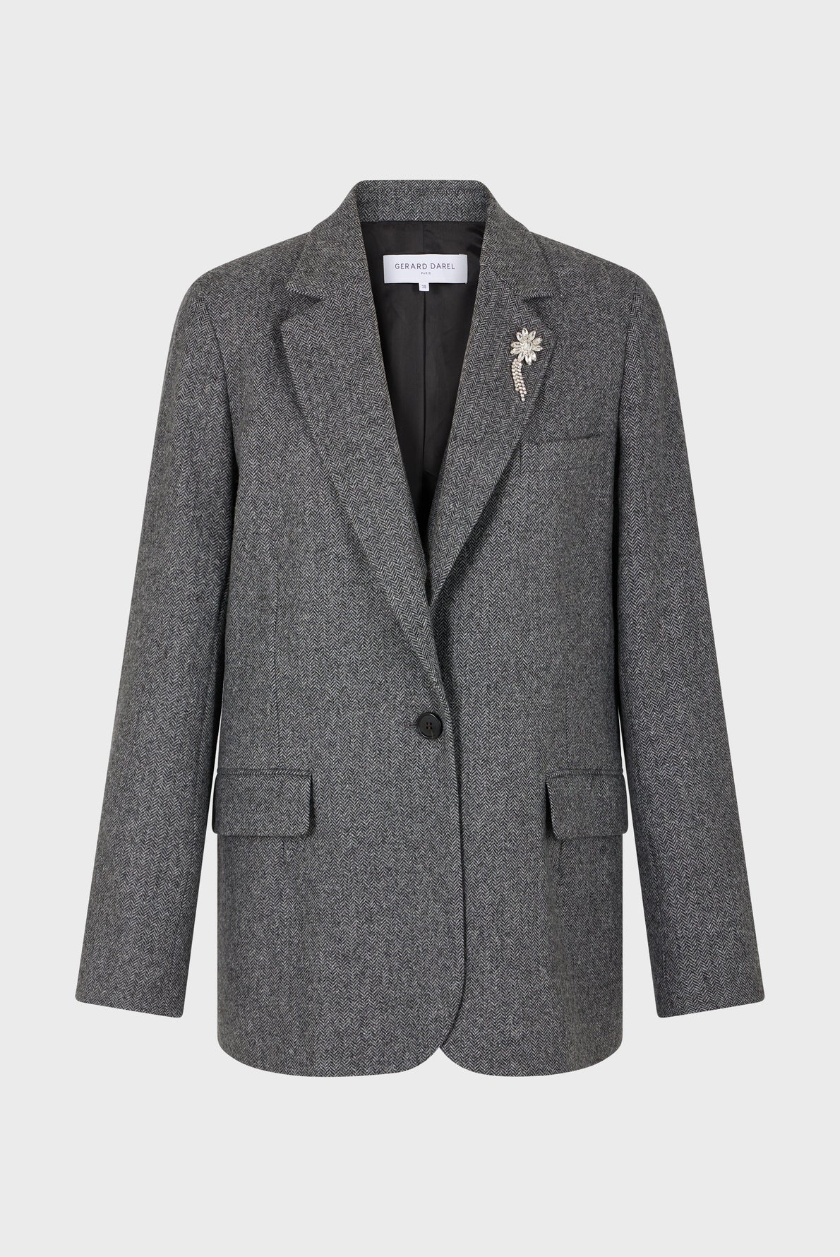 Gray veste laine mélangée blazer with a notched lapel, single button closure, two front pockets, and a decorative fleur en strass brooch on the left side, displayed on a plain white background.