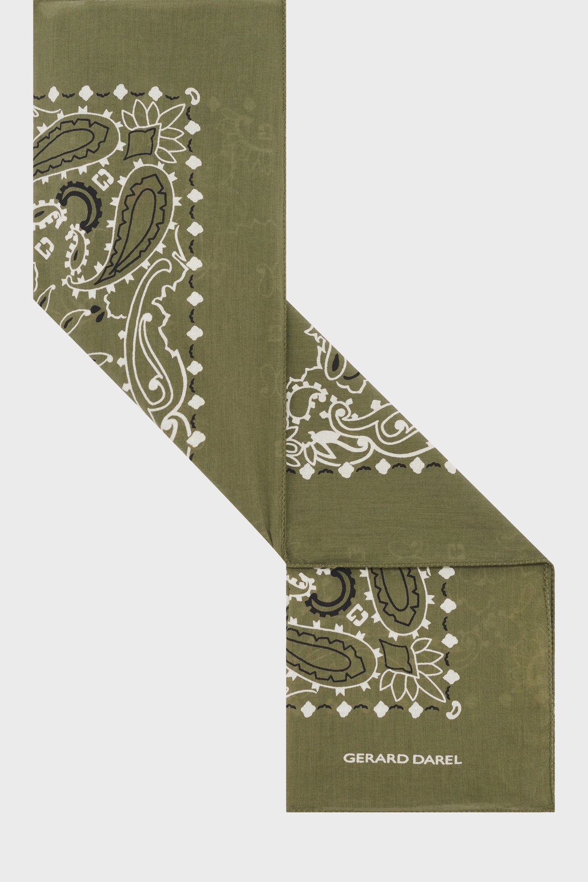 Olive green bandana with a white paisley and geometric print, folded diagonally. This bandana motifs géométriques design captures a subtle, vintage charm, while the brand name GERARD DAREL is printed in white on one end.