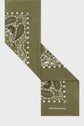 Olive green bandana with a white paisley and geometric print, folded diagonally. This bandana motifs géométriques design captures a subtle, vintage charm, while the brand name GERARD DAREL is printed in white on one end.