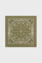 Olive green bandana vintage featuring an intricate white paisley and floral pattern with small black accents and the text GRAND CANAL in the lower right corner. Crafted from soft bandana coton, it showcases classic bandana motifs géométriques against a light gray background.