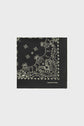 A folded black bandana coton with a beige paisley and dotted border pattern, featuring classic bandana motifs géométriques and the brand name Gerard Darel printed in white on one corner, placed on a plain white background.