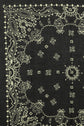 Black bandana with intricate white paisley, floral, and geometric patterns along the border and scattered small shapes in the center. Made from soft bandana coton, the design is symmetrical and decorative, featuring classic bandana motifs géométriques for a timeless vintage look.