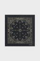 A dark square bandana en coton features an intricate, symmetrical beige paisley pattern with floral and decorative details inspired by bandana motifs géométriques, set against a plain background for a timeless, vintage appeal.