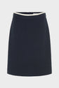 A navy blue, textured A-line jupe courte with a white waistband detail, crafted from coton mélangé and displayed on a plain, light background.