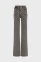 Gray high-waisted, wide-leg jeans with an all-over repeating motif géométrique and two large front pockets. The fabric features a subtle hexagonal design and orange-brown stitching, blending classic jean flare style with modern details.