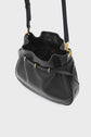 A black cuir grainé leather sac seau with gold hardware, an adjustable strap, and an open top revealing a spacious interior with a gathered pocket—perfect for carrying essentials with élégance sophistiquée.