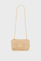 A small beige sac raphia, meticulously crafted with savoir-faire artisanal, featuring a gold bandoulière chaîne and a gold clasp, displayed against a plain white background.