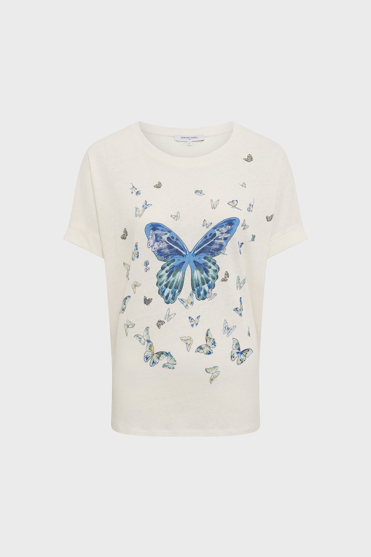 White short-sleeve t-shirt featuring a large blue butterfly and multiple smaller butterflies printed on the front.