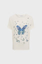 White short-sleeve t-shirt featuring a large blue butterfly and multiple smaller butterflies printed on the front.
