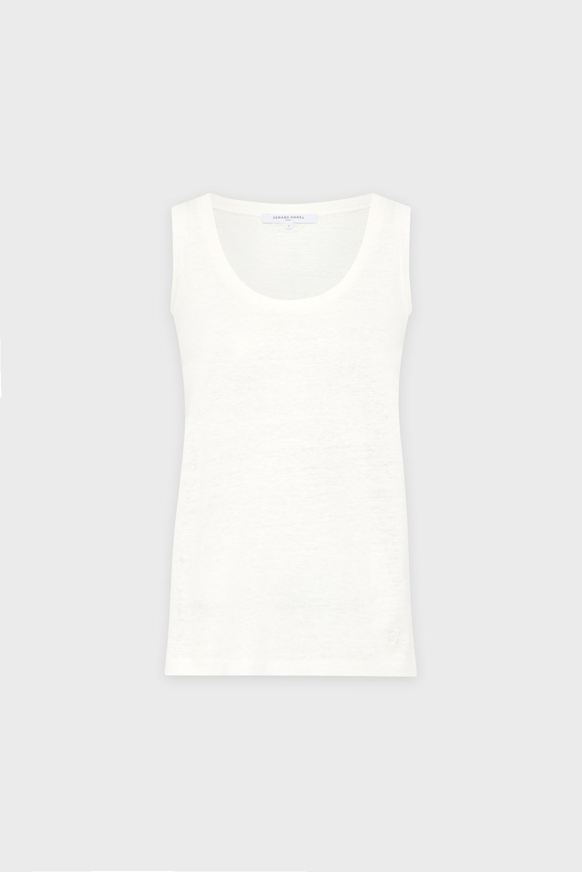 A sleeveless, white scoop-neck tank top (débardeur sans manche) is displayed against a plain light gray background. This débardeur été appears simple and unadorned, crafted from a soft, lightweight fabric for effortless summer style.