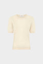 Short-sleeved, light beige knit sweater with a crew neckline (pull col rond), displayed on a plain white background.