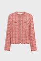 A red and white tweed jacket, this veste courte femme features a round neckline, long sleeves, front pockets with gold buttons, and elegant fringe trim on the hem and cuffs—a timeless veste rouge chic perfect for elevating any look.
