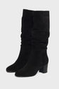 A pair of black, mid-calf suede boots with a slouchy design and chunky block heels, displayed against a plain white background.