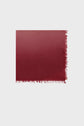 A rectangular, red ombre echarpe cachemire with fringed edges on two sides, displayed flat against a plain white background.