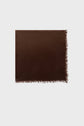 A rectangular écharpe marron crafted from a luxurious laine cachemire blend, featuring short, fine fringe along the right and bottom edges, displayed against a plain, light gray background.