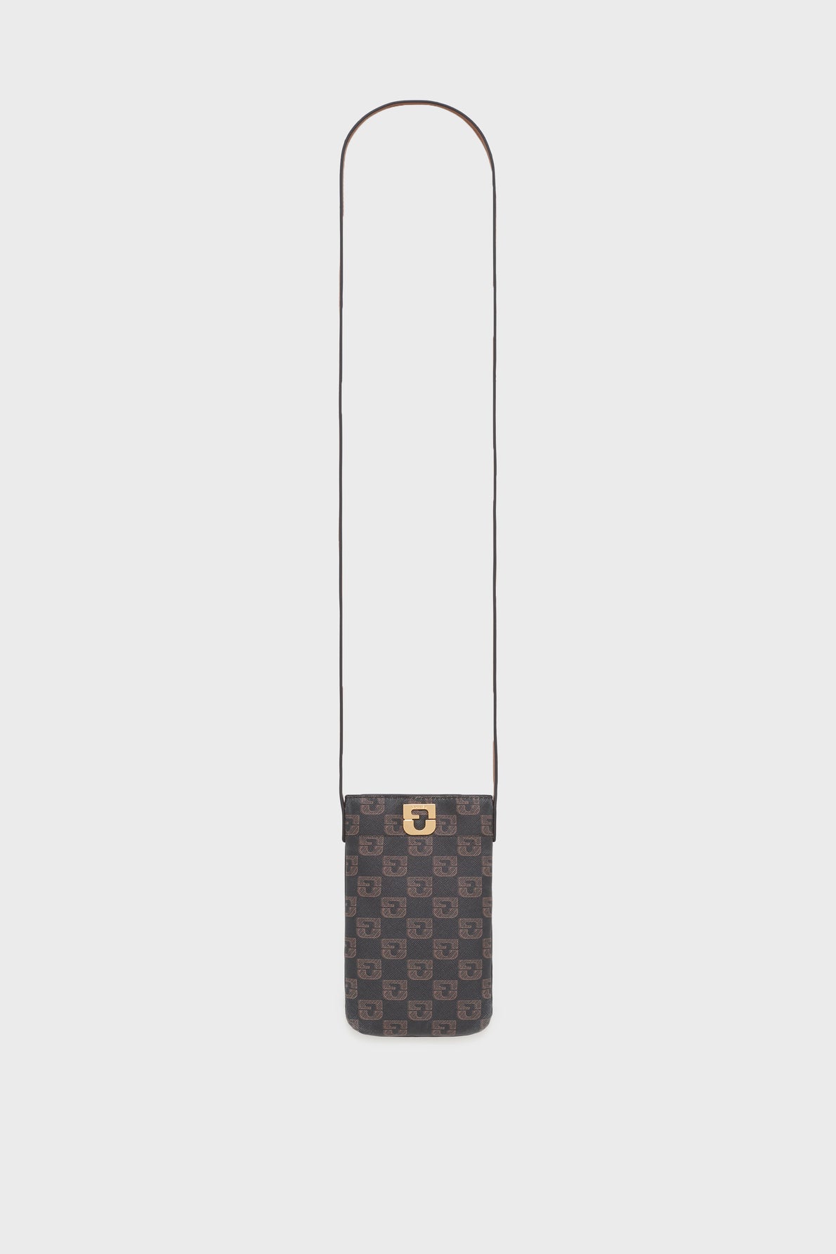 Small, rectangular crossbody bag with a long strap, patterned with a repeating dark brown geometric design in toile enduite monogrammée and finished with a gold clasp on the front. This accessoire tendance is displayed on a plain white background.