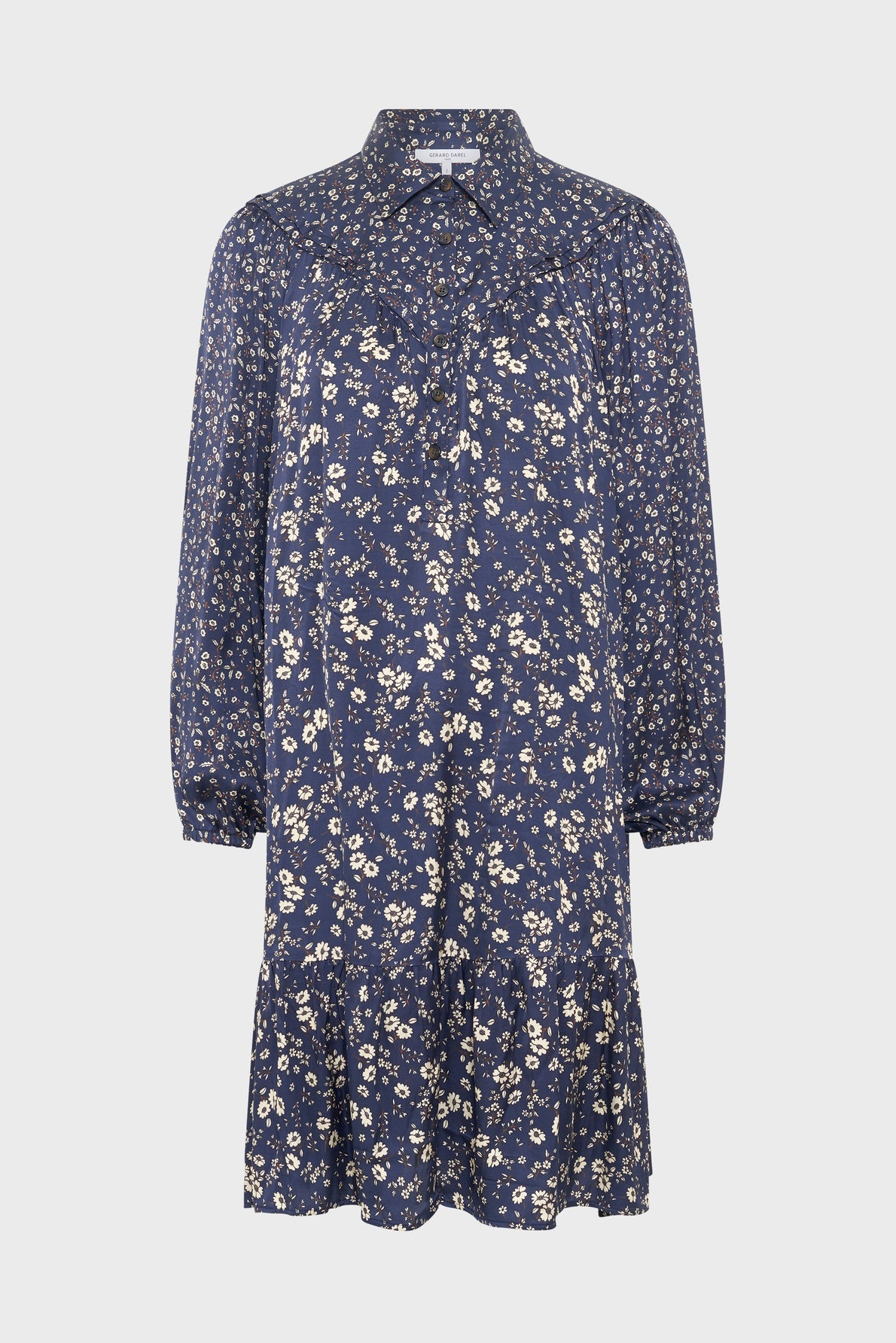 A navy blue long-sleeve robe mi-longue with a small white floral pattern, button-up front, collar, gathered yoke, and ruffled hem, displayed on a white background.