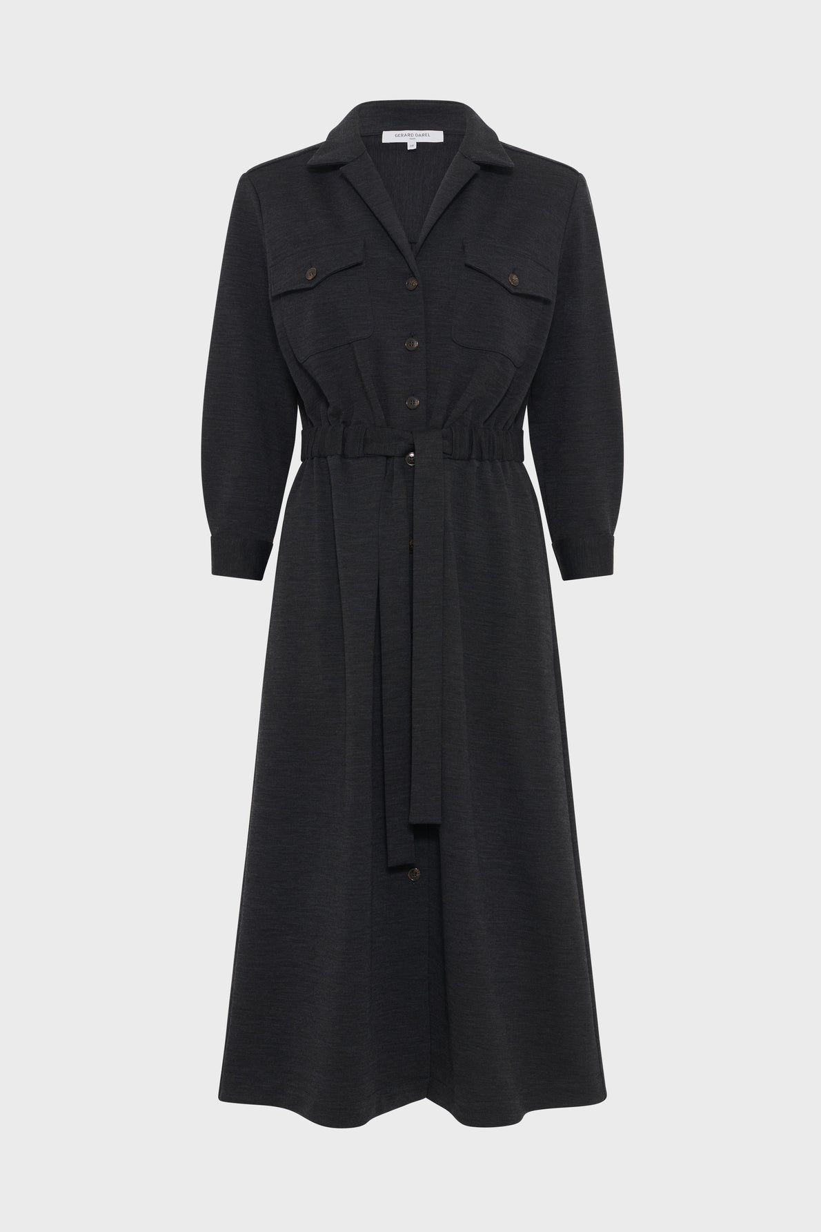 A long-sleeve black midi robe chemise featuring a shirt collar, button-down front, chest pockets, and a ceinture à nouer crafted from matching fabric at the waist.