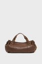 A brown leather sac à main with two short handles, gold-tone hardware, and gathered sides, set against a plain white background.