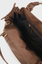 Open brown cuir sac à main with gold hardware, showing a spacious black-lined interior and a zippered pocket on the inside. This sac 24H features a drawstring-style top and two handles.
